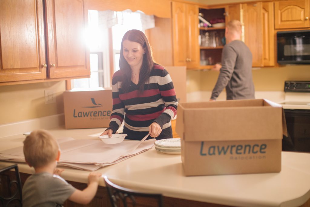 A child helping unbox during a move.