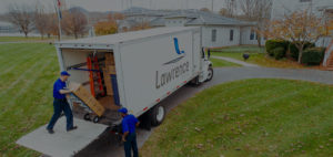 Two movers unloading a Lawrence Moving truck.