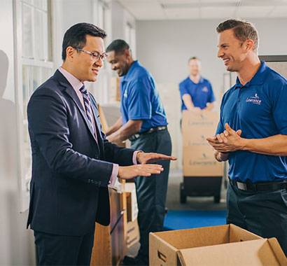 Corporate relocation movers discuss a office move.
