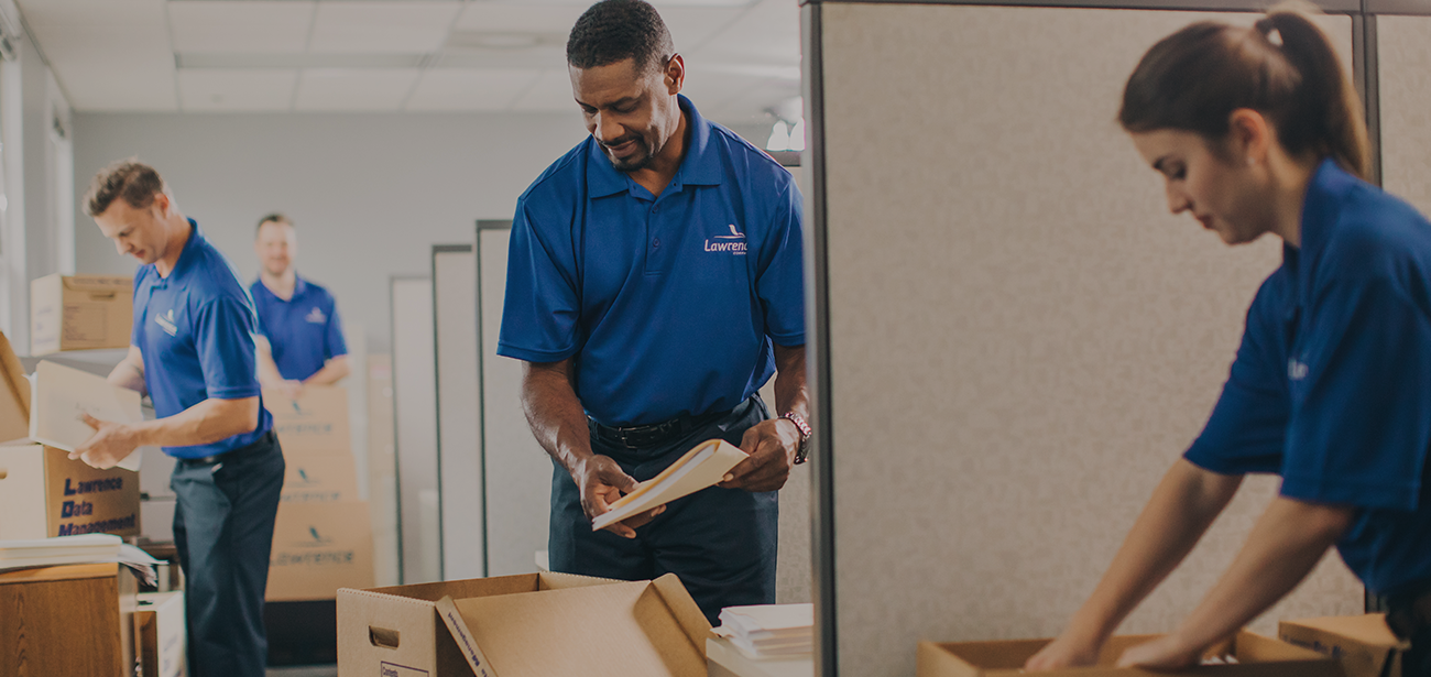 Office Movers Unpacking Boxes