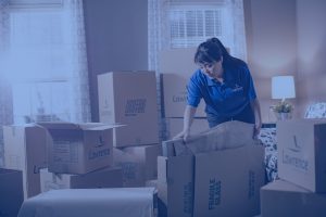 woman packing boxes for a moving company