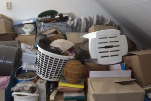 Old household items needing to be decluttered like old small appliances and clothes.